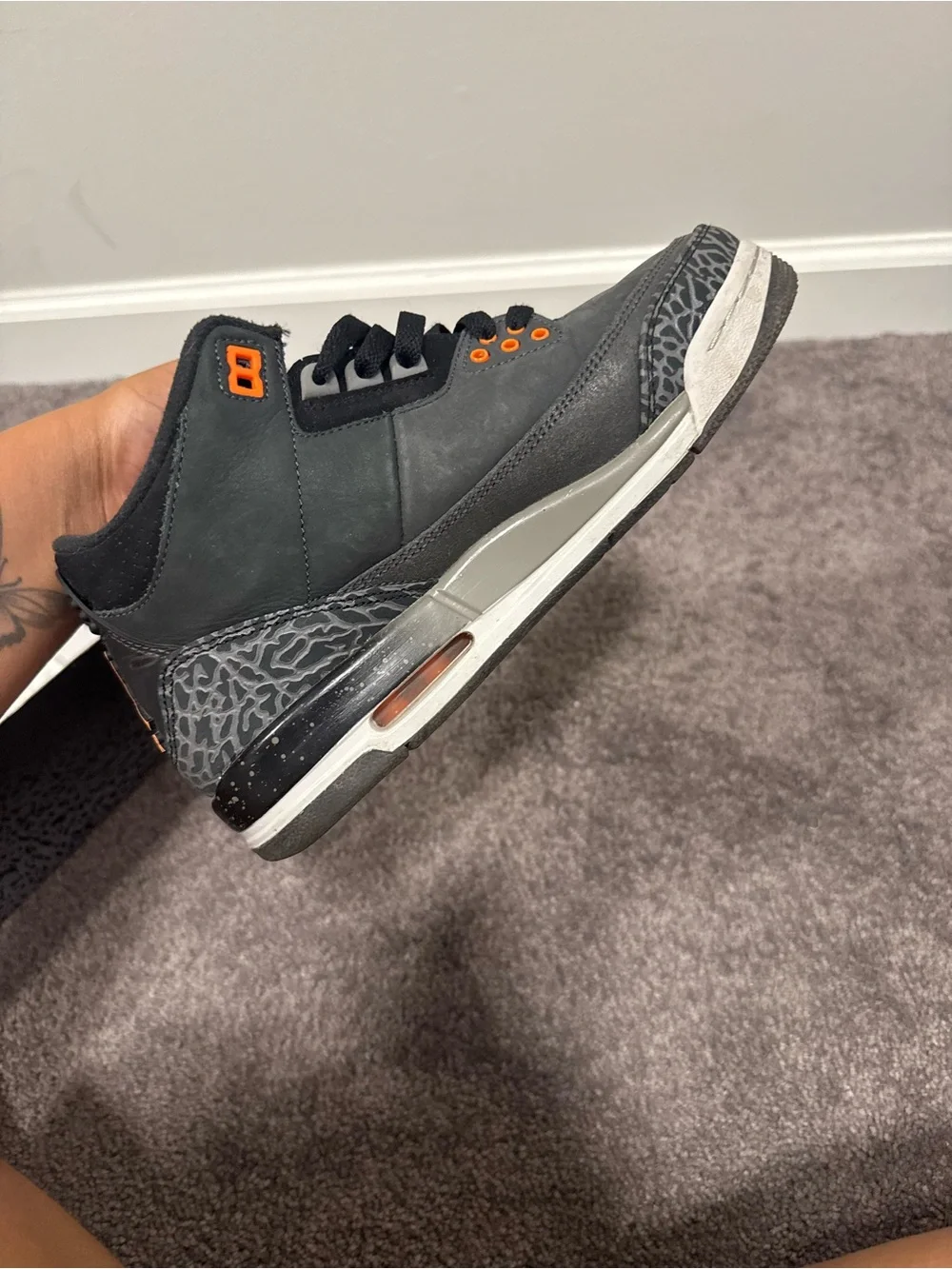 Jordan Black Sneakers with Orange Accents